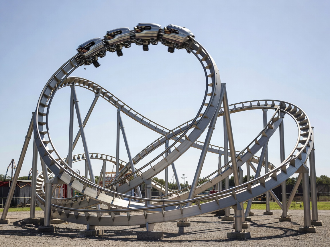Steel roller coaster track twist and inversions